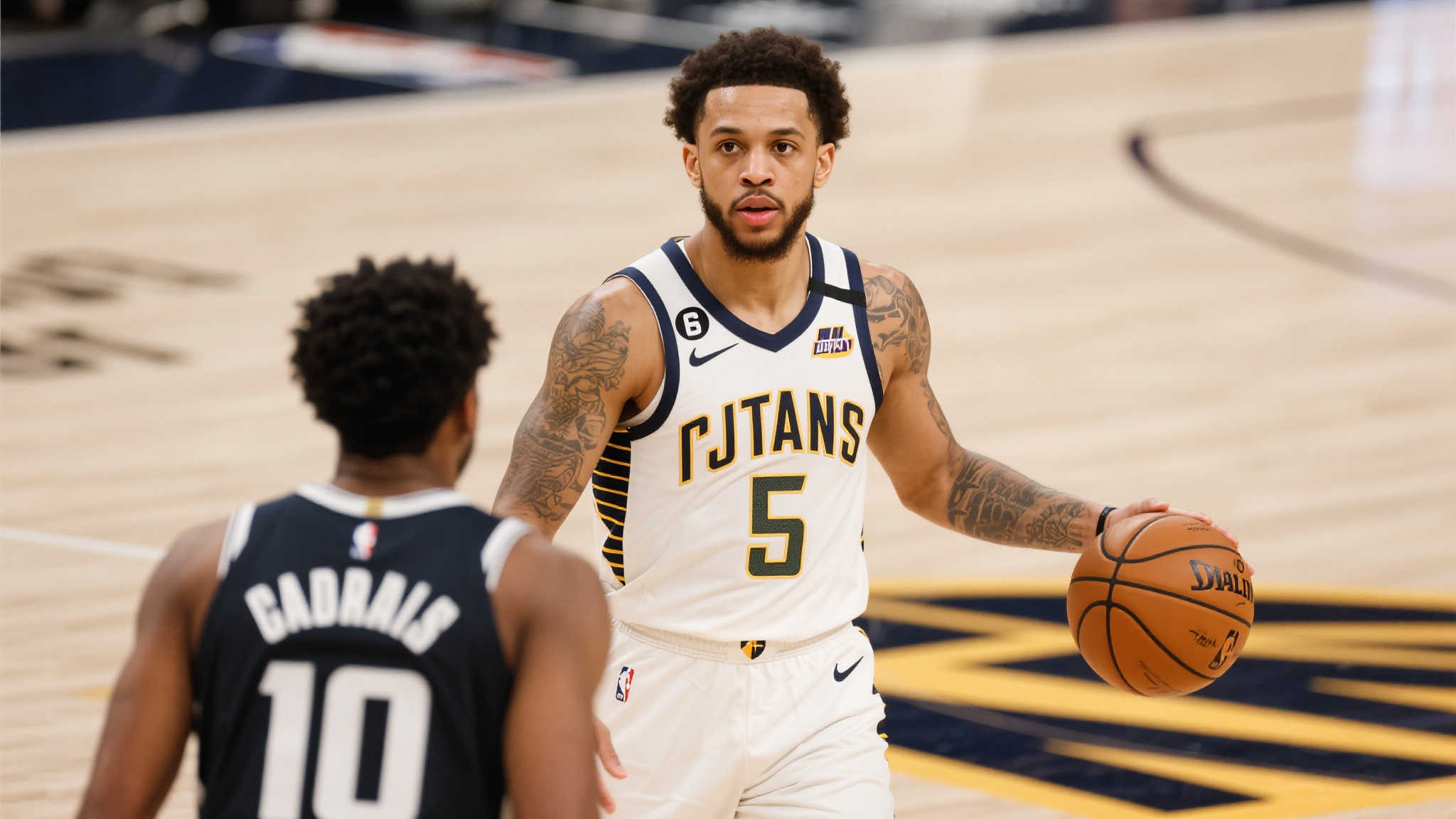 TJ·麦康奈尔是一名天生具备团队性思维的控卫，以冷